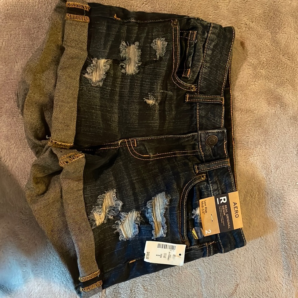 NWT AERO LOW RISE midi size 2